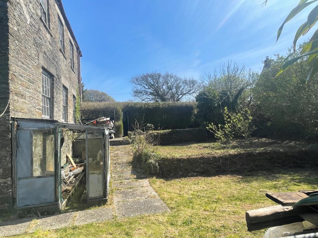Lot: 103 - CHARACTER PROPERTY FOR IMPROVEMENT - Side elevation of property and garden space with greenhouse